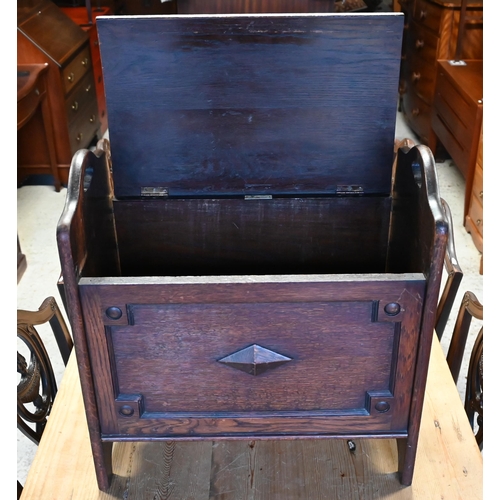 264 - An oak box seat with brass studded leather squab