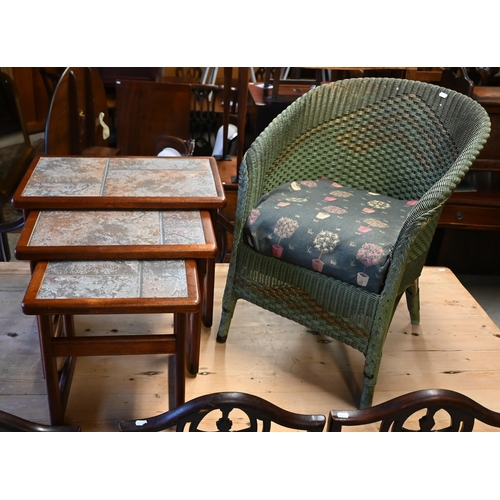 274 - A nest of three tiled top tables to/w a green Lloyd Loom chair