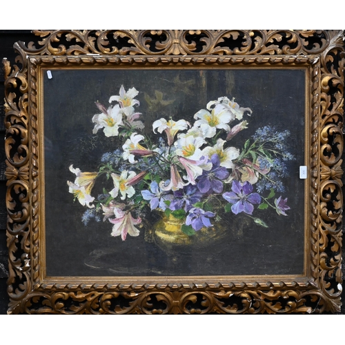 300 - A still life study of flowers, oil on canvas, with decorative rococo gilt frame, 79 x 62 cm a/f