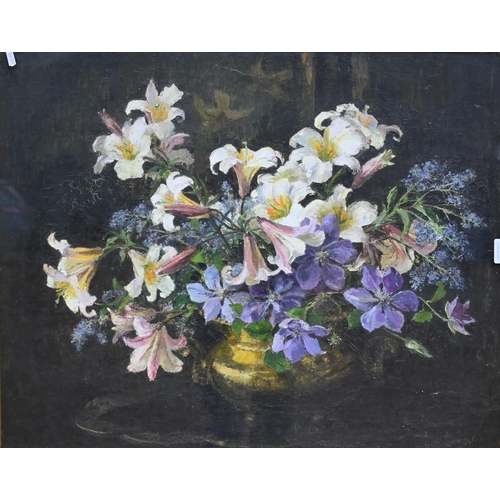 300 - A still life study of flowers, oil on canvas, with decorative rococo gilt frame, 79 x 62 cm a/f