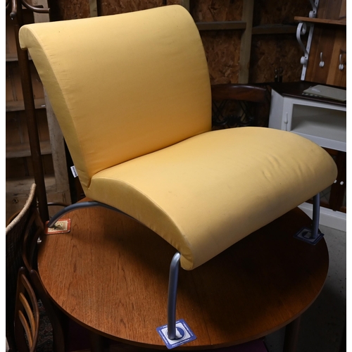 33 - A contemporary yellow fabric (zip cover) tubular alloy framed easy chair