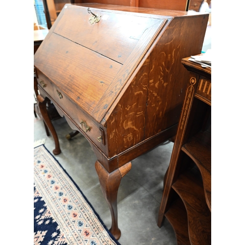 362 - A Georgian oak fall front bureau on stand with fitted interior and dummy drawer raised on pad footed... 