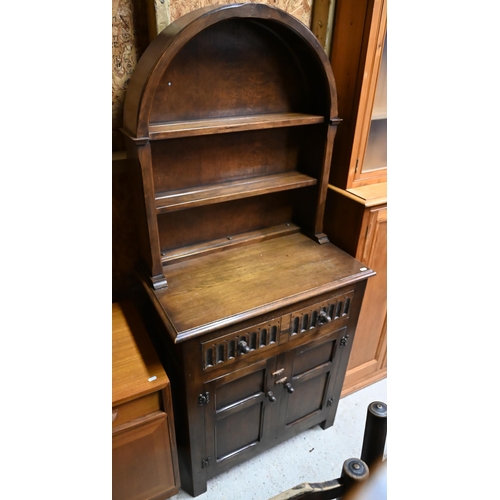 37 - A stained oak 'Old Charm' style arched top cottage dresser, 77 cm w x 43 cm x 162 cm h