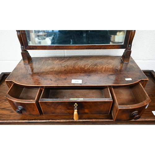 378 - A 19th century mahogany toilet mirror on bow front three drawer platform base with bun feet 55 cm w ... 