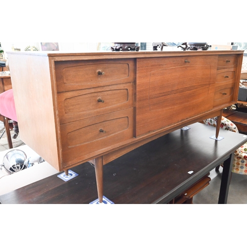 395 - A Grange, London mid century teak sideboard with fall-front cupboard and six drawers, raised on tape... 