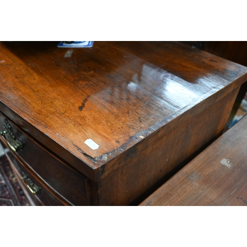 404 - A 19th century mahogany bowfront chest of two short over three long drawers raised on cut-down/reduc... 