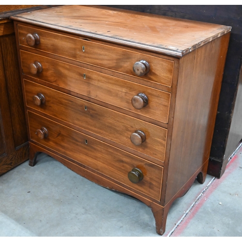 408 - A small Victorian mahogany chest of four long graduating drawers with turned handles, raised on spla... 