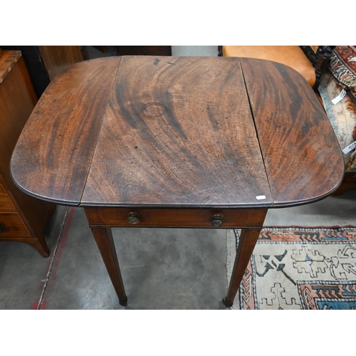 410 - A 19th century mahogany inlaid Pembroke table on tapering square supports with brass caps and caster... 