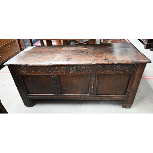 413 - An antique carved oak coffer 120 cm w x 46 cm d x 55 cm h 