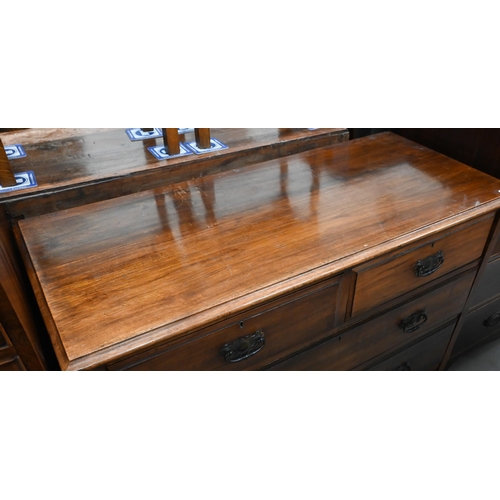 415 - An Edwardian walnut low chest of two short over three long drawers (A/F) 88 cm w x 44 cm d x 93 cm h