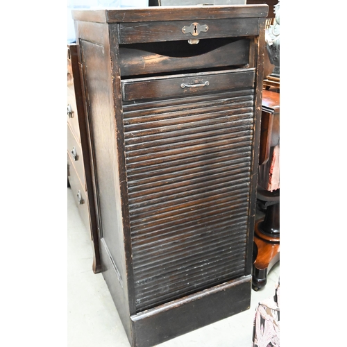 419 - An early 20th century oak tambour front filing cabinet with nine drawers (in saleroom 2 office) 46 c... 