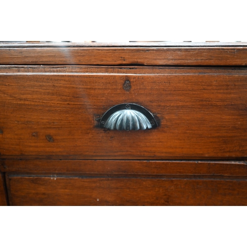 422 - A hardwood chest of two short over two long drawers with cupped shell cast handles