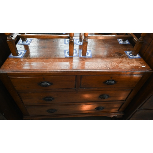 422 - A hardwood chest of two short over two long drawers with cupped shell cast handles