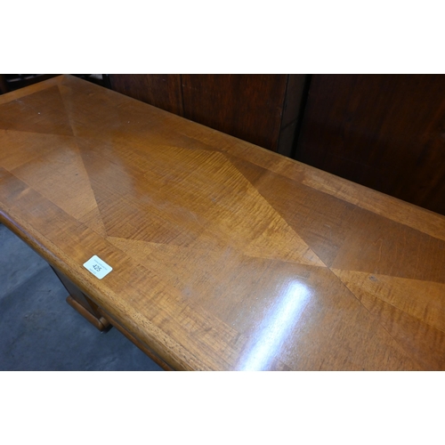 425 - A modern twin pedestal diamond veneered console table 126 cm w x 42 cm d x 72 cm h 