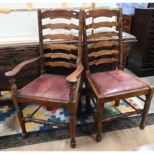 433 - A substantial reproduction hardwood wake/dining table with two drawers raised on turned gate-leg act... 