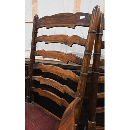 433 - A substantial reproduction hardwood wake/dining table with two drawers raised on turned gate-leg act... 