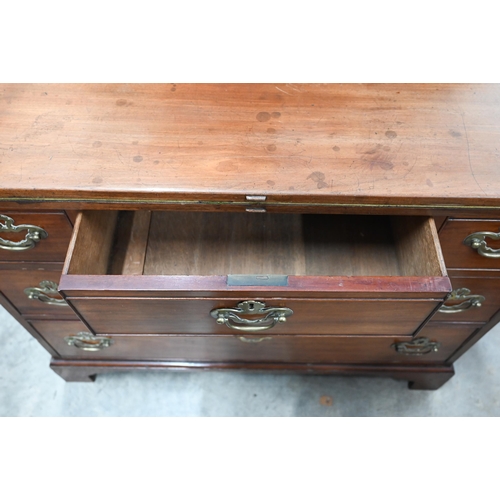 472 - A 19th century mahogany games chest with folding baize lined top over five drawers raised on bracket... 