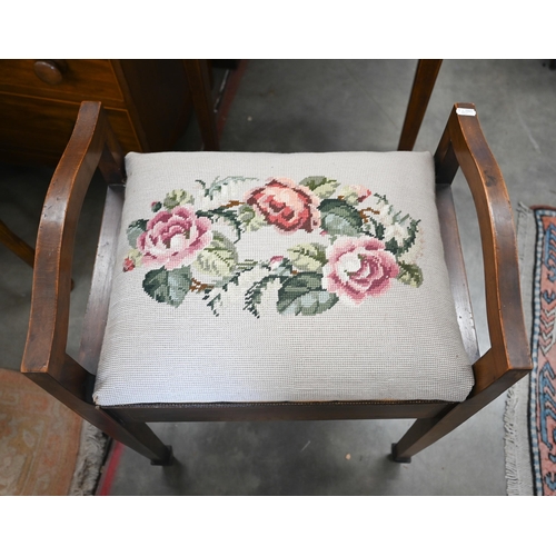 473 - An early 20th century beech children's elbow chair to/w Edwardian walnut piano stool with floral tap... 