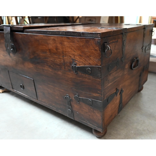 484 - An Indian rosewood and iron bound wedding chest/coffee table with hinged tri-panelled top, 110 x 60 ... 