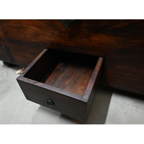 484 - An Indian rosewood and iron bound wedding chest/coffee table with hinged tri-panelled top, 110 x 60 ... 