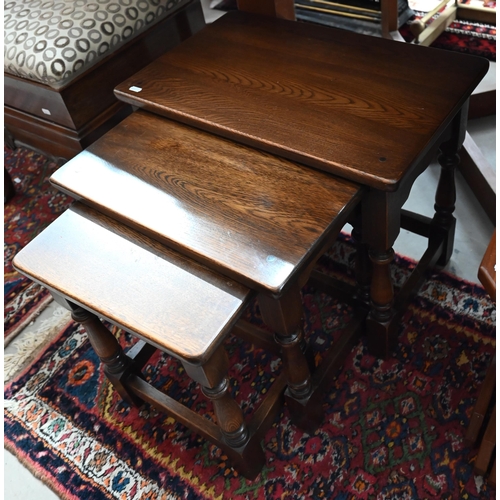 493 - A nest of three 1970s teak tables, the largest with inset tile-top to/w Old Charm style nest of oak ... 