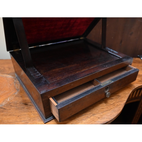 501 - A 19th century rosewood reading stand with adjustable tilt-top above a fitted drawer, 33 cm