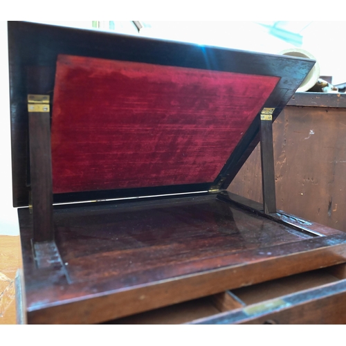 501 - A 19th century rosewood reading stand with adjustable tilt-top above a fitted drawer, 33 cm