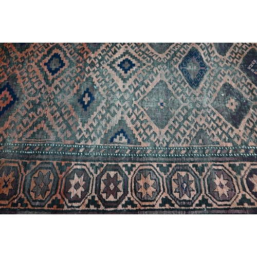 566 - An old worn Persian Baluch, arrangement of diamond medallions on brown ground, rosette border, 214 x... 