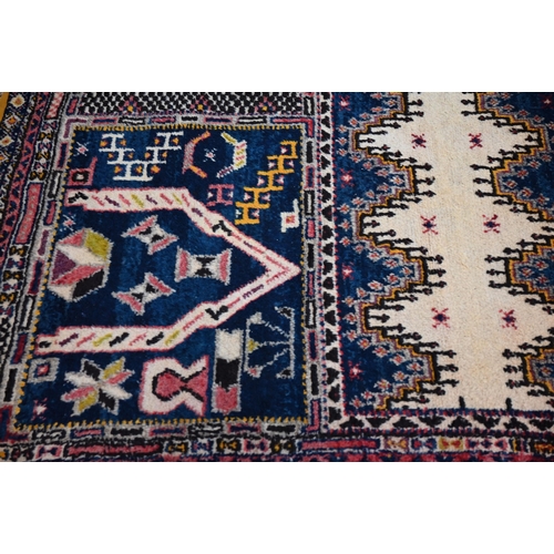 569 - A thick piled Moroccan mosaic tile design carpet, 220 x 164 cm