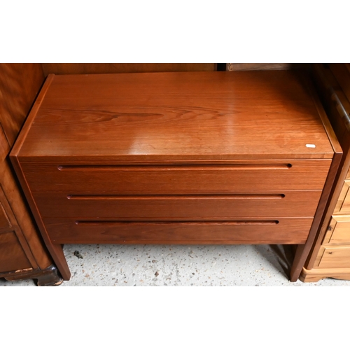 594 - A mid-century teak chest of three long drawers on square legs, 90 x 43 x 88 cm h