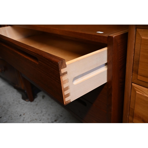 594 - A mid-century teak chest of three long drawers on square legs, 90 x 43 x 88 cm h