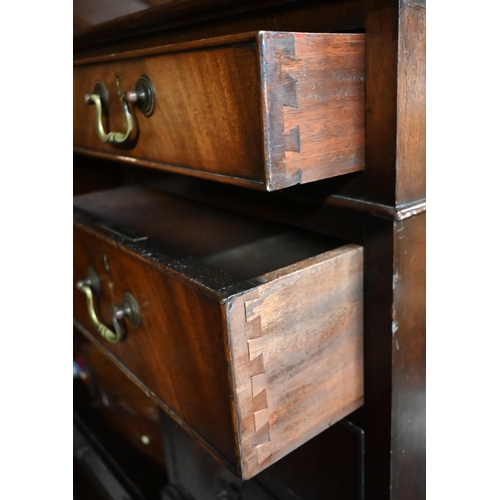 603 - A large twin pedestal mahogany desk with pale  green leather top over an arrangement of nine dr... 