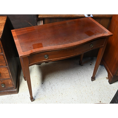 614 - A Victorian style serpentine front single drawer side table on square tapering legs to spade toes, 9... 