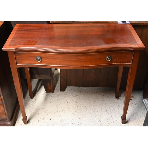 614 - A Victorian style serpentine front single drawer side table on square tapering legs to spade toes, 9... 