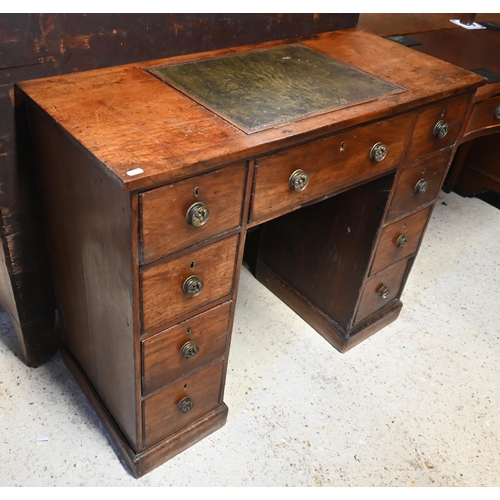 615 - A Victorian reading/writing table with central leather inset easel panel over an arrangement of nine... 