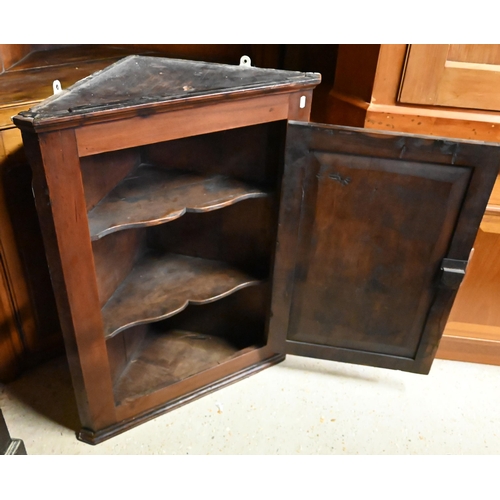 620 - #An antique stained pine hanging corner cabinet