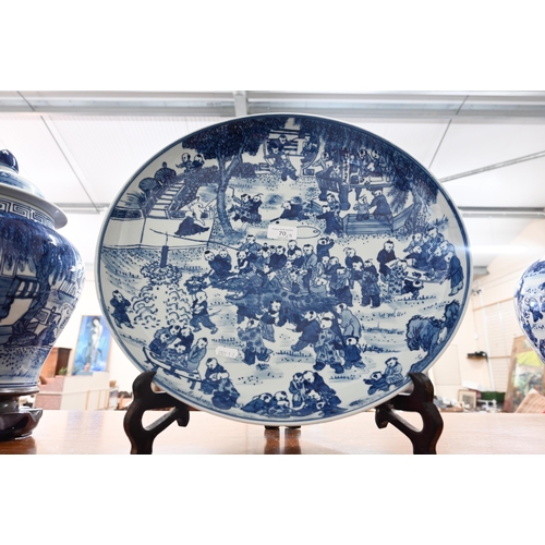 70 - Chinese porcelain blue and white dished charger, decorated with '100 Boys' pattern, 41 cm to/w two c... 