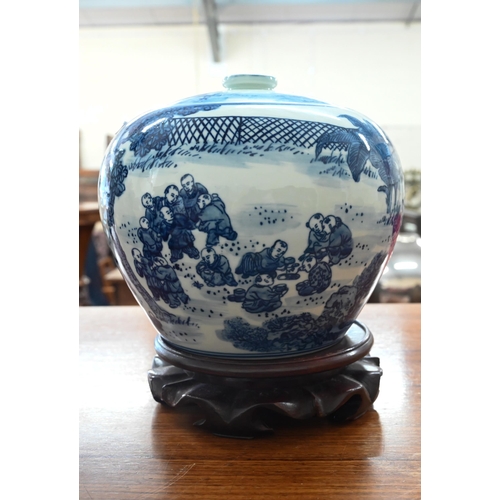 70 - Chinese porcelain blue and white dished charger, decorated with '100 Boys' pattern, 41 cm to/w two c... 