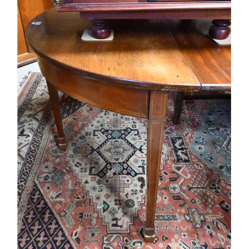 289 - A Georgian mahogany d-end dining table, with 2 leaves, raised on moulded square legs