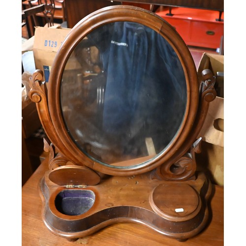 289A - A Victorian mahogany oval toilet mirror