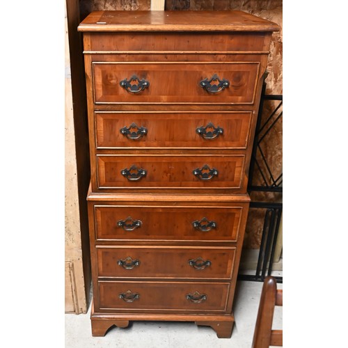 29 - A diminutive reproduction yew chest on chest style six drawer chest, 51 cm w x 37 cm x 115 cm h