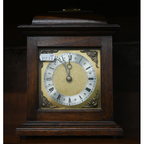 393 - A walnut and brass mounted mantel clock with moon-phase dial and twin train movement, 24 cm high c/w... 