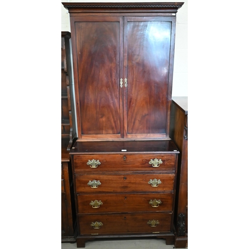 384 - A George III mahogany secretaire chest, the top drawer with fitted interior over a standard drawer a... 