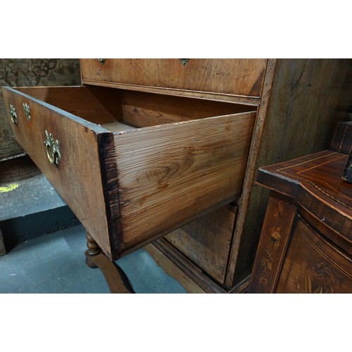 254 - An 18th century walnut chest on stand, with two short over three long graduated drawers with brass p... 