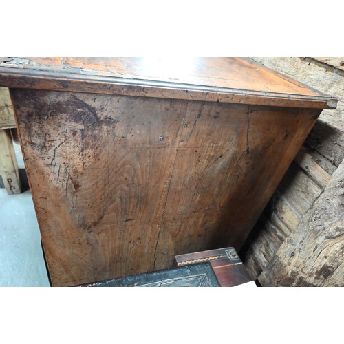 254 - An 18th century walnut chest on stand, with two short over three long graduated drawers with brass p... 