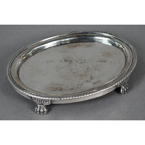 113 - Regency oval silver tea pot stand with engraved decoration, gadrooned rim and paw feet, maker's mark... 