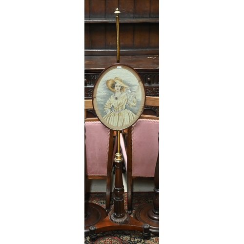 48 - A Regency rosewood pole screen, the adjustable rise and fall pole with needlepoint panel on a trifor... 