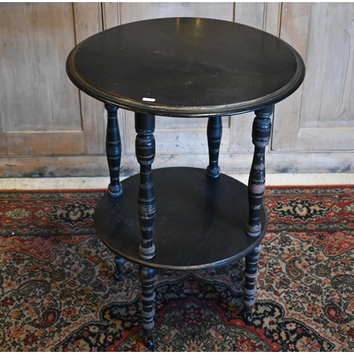 11 - An ebonised circular two-tier table stand, 51 cm dia. x 67 cm h to/with a Victorian mahogany drop le... 