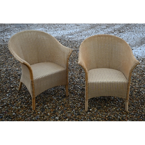 14 - A set of four modern Lloyd Loom chairs to/w a circular teak drop leaf garden table a/f (5)