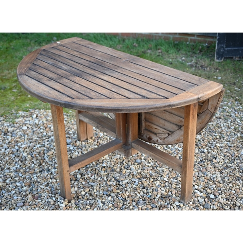 14 - A set of four modern Lloyd Loom chairs to/w a circular teak drop leaf garden table a/f (5)